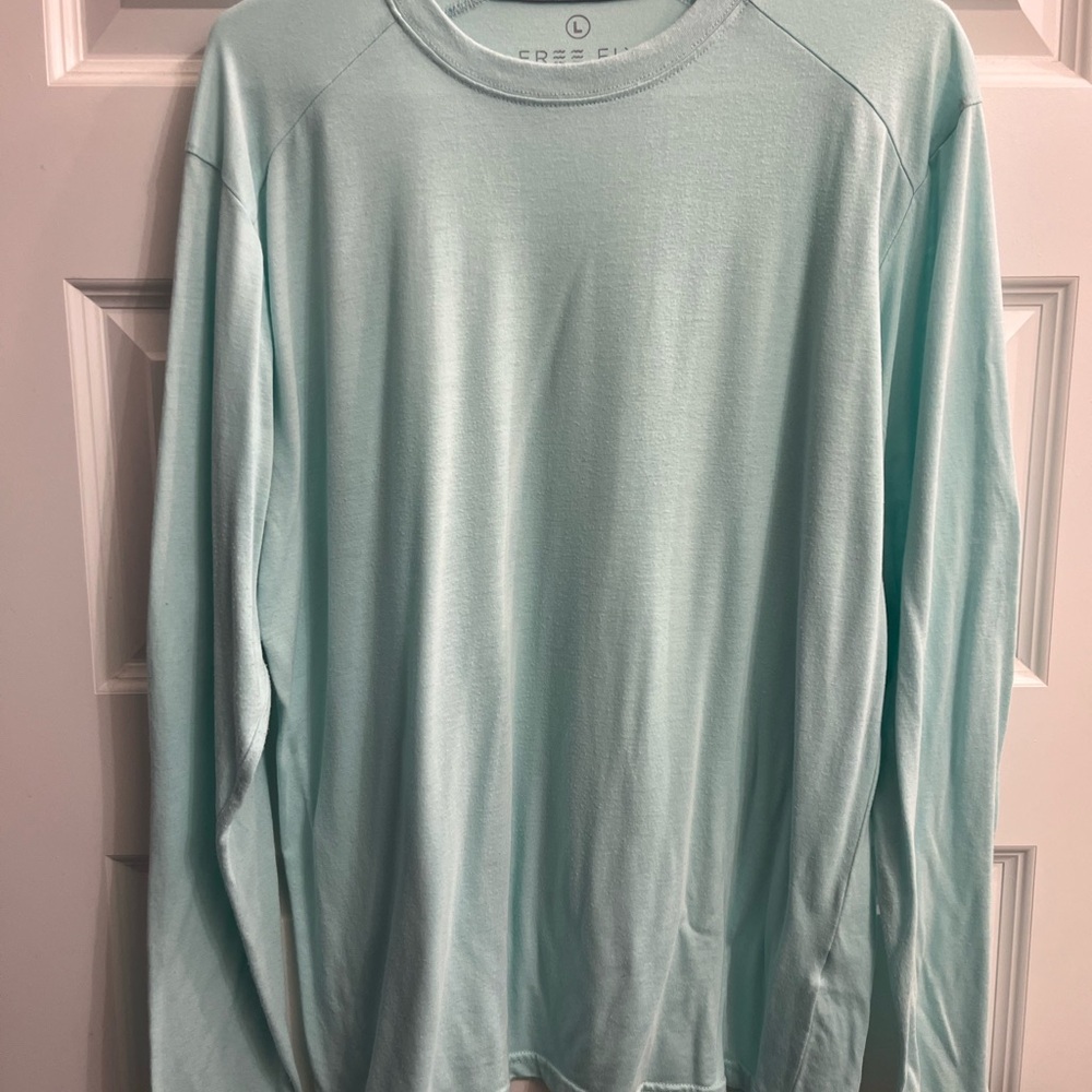 Free Fly light blue/ seafoam green long sleeve shirt.